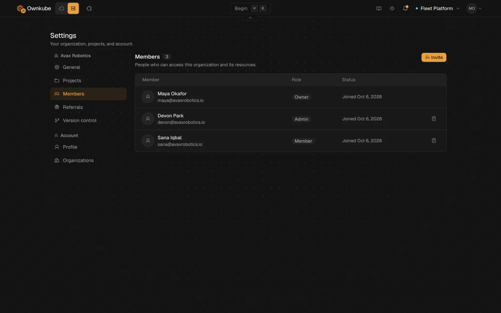 Screenshot of the Members settings listing organization members with their roles and a pending invite